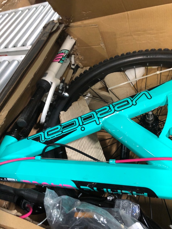 Photo 3 of Dynacraft Vertical Dual Suspension Mountain Bike Girls 24 Inch Wheels with 18 Speed Grip Shiter and Dual Hand Brakes in Teal and Pink