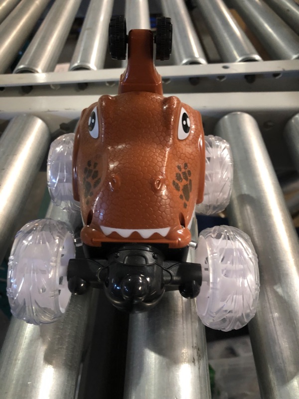 Photo 1 of Kizeefun Remote Control Car, Dinosaur RC Stunt Car Invincible 360°Rolling Twister with Colorful Lights & Music Switch,