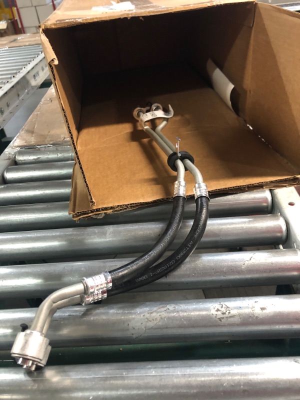 Photo 1 of GM Genuine Parts 15194579 Engine Oil Cooler Inlet and Outlet Hose Kit with Clip, Connector, and Seal, Black