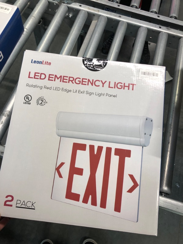 Photo 1 of LEONLITE 2 LED EMERGENCY LIGHT ROTATING RED LED EDGE LIT EXIT SIGN LIGHT PANEL
