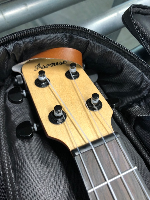 Photo 1 of Asmuse Concert Ukulele Mahogany 23 Inch Ukelele for Kids with Free Online Lesson Gig Bag Strap Nylon String Tuner Picks (Black)