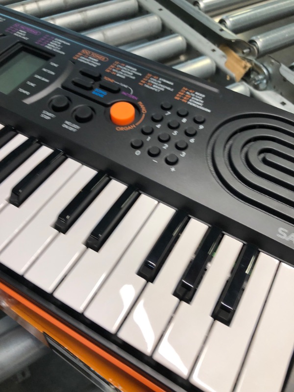 Photo 1 of Casio SA-76 44-Key Mini Personal Keyboard ORANGE SA-76 Keyboard