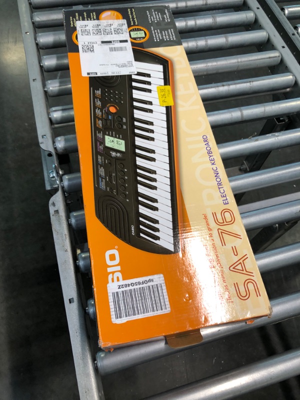 Photo 2 of Casio SA-76 44-Key Mini Personal Keyboard ORANGE SA-76 Keyboard