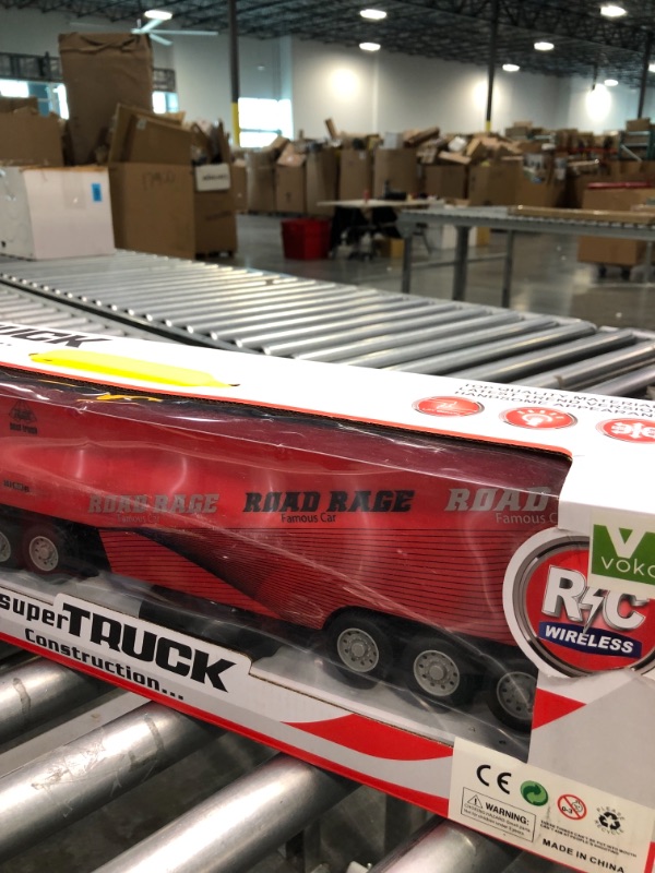 Photo 4 of Vokodo RC Semi Truck And Trailer 23" With Lights Electric Hauler Remote Control Kids Big Rig Toy Carrier Van Transport Vehicle Ready To Run Semi-truck Cargo Car Great Gift For Children Boys Girls Red