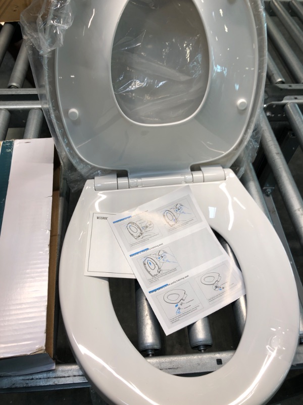 Photo 2 of Round Toilet Seat with Built in Potty Training Seat, Slow Close, Easy Clean, Plastic, White