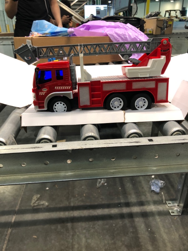 Photo 2 of Fire Truck Toys for Kids with Lights and Real Siren Sounds,Extending Rotating Ladder Rescue Fire Engine Toy Trucks Pull Back Toy Trucks for 3 4 5 6 Years Old Boys Girls Gift