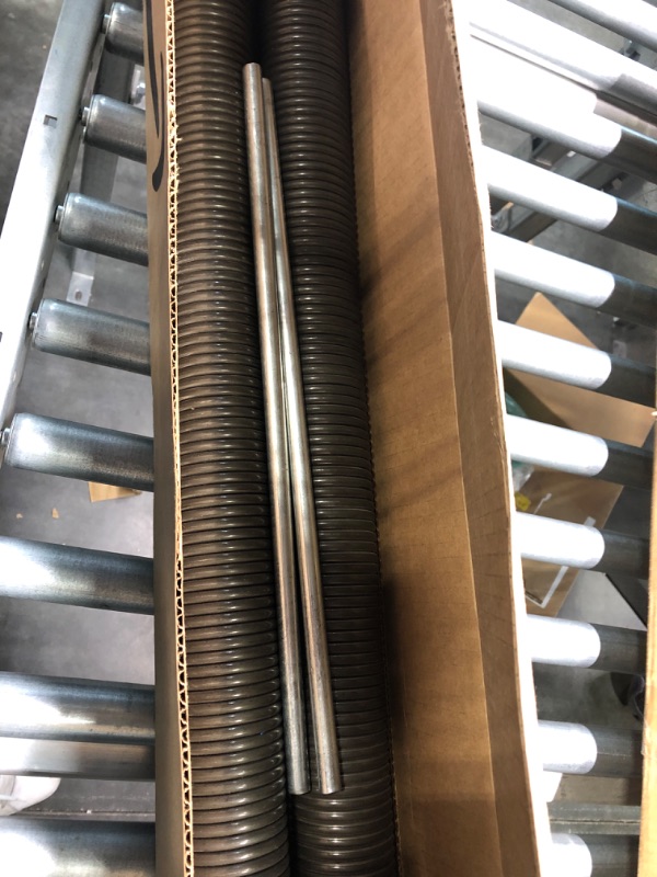 Photo 1 of Garage Door Torsion Springs with Winding Bars