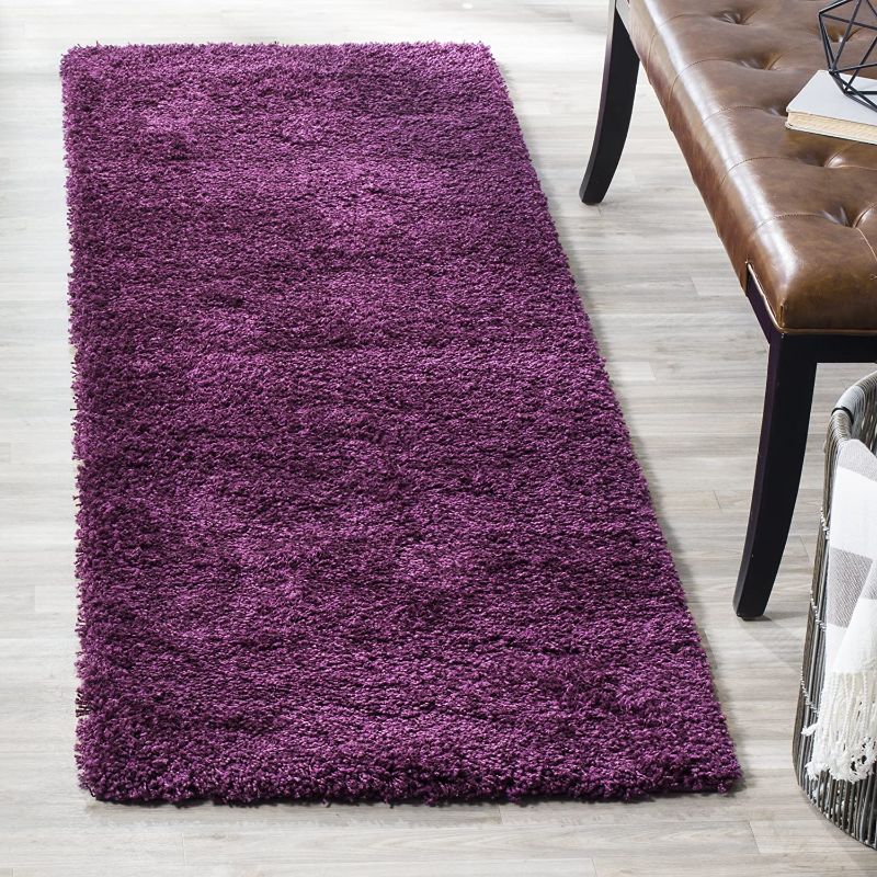Photo 1 of 5FTX2FT purple rug  