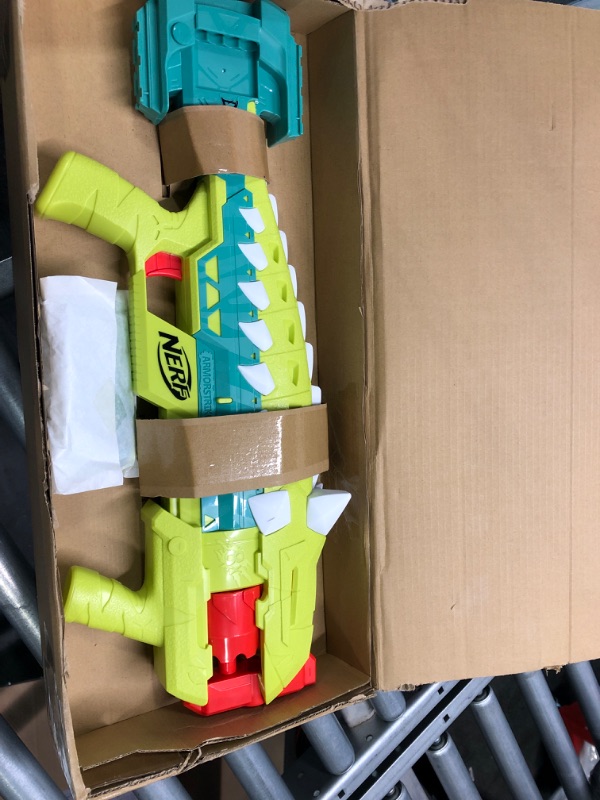 Photo 1 of NERF DinoSquad Armorstrike Dart Blaster, 8-Dart Rotating Drum, 16 Darts, Indoor and Outdoor Games, Dinosaur Toys for 8 Year Old Boys and Girls and Up, Drop Grip, Dart Storage, Anklyosaurus Dinosaur