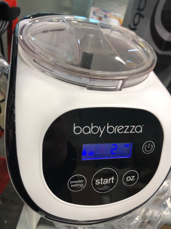 Photo 7 of Baby Brezza Formula Pro Mini Baby Formula Maker – Small Baby Formula Mixer Machine Fits Small Spaces and is Portable for Travel– Bottle Makers Makes The Perfect Bottle for Your Infant On The Go Formula Pro Mini Dispenser Machine