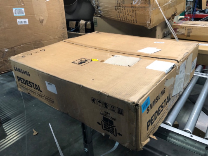 Photo 1 of SAMSUNG 27” Wide Laundry Riser Pedestal Stand for 27” Wide Front Load Washer or Dryer, Lifts Machine 6”in Height, WE272NV/A3, Stainless Steel, Brushed Black