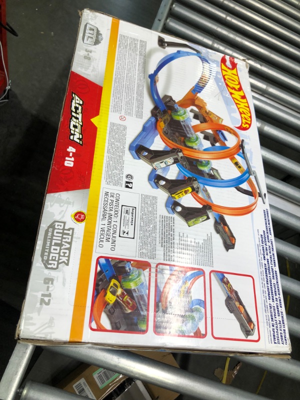 Photo 3 of Hot Wheels Track Set and Toy Car, Large-Scale Motorized Track with 3 Corkscrew Loops, 3 Crash Zones and Toy Storage??
-appears new open box-
