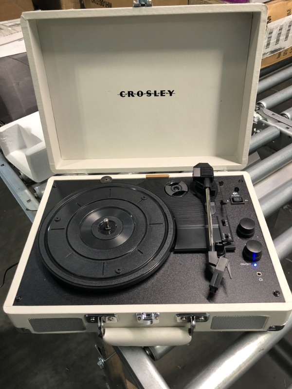 Photo 2 of Crosley CR8005F-WS Cruiser Plus Vintage 3-Speed Bluetooth in/Out Suitcase Vinyl Record Player Turntable, White Sand Bluetooth In/Out White Sand
-appears new open box-unable to test

