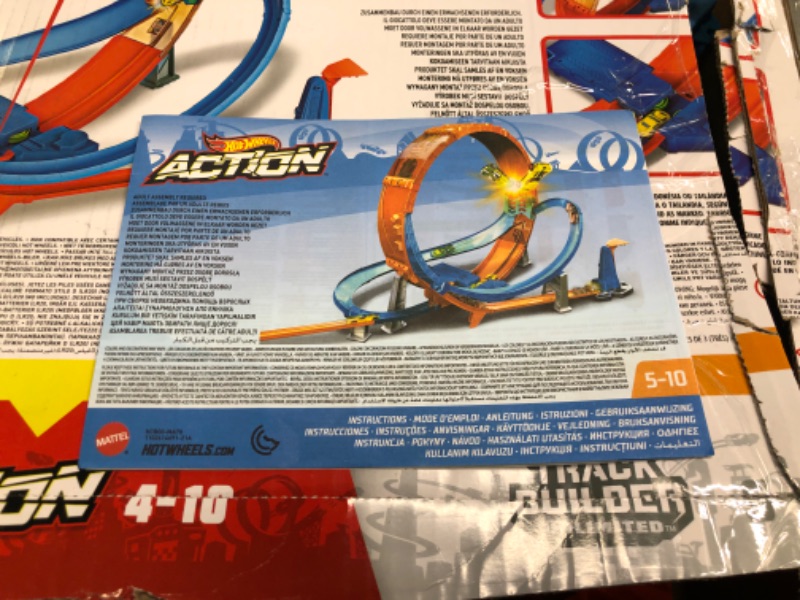 Photo 3 of Hot Wheels Massive Loop Mayhem Track Set with Huge 28-Inch Tall Track Loop Slam Launcher, Battery Box & 1 Hot Wheels 1:64 Scale Car, Designed for Multi-Car Play, Gift for Kids 5 Years Old & Up SIOC/FFP Track Set
-appears new open box-
