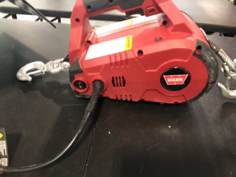 Photo 2 of WARN 885000 PullzAll Corded 120V AC Portable Electric Winch with Steel Cable: 1/2 Ton (1,000 Lb) Pulling Capacity , Red