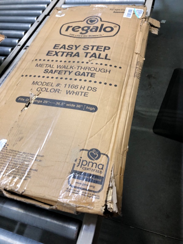 Photo 1 of Regalo Easy Step 36" Extra Tall Walk Thru Baby Gate, Includes 4-Inch Extension Kit, 4 Pack of Pressure Mount Kit and 4 Pack Wall Cups and Mounting Kit, Pack of 1 White