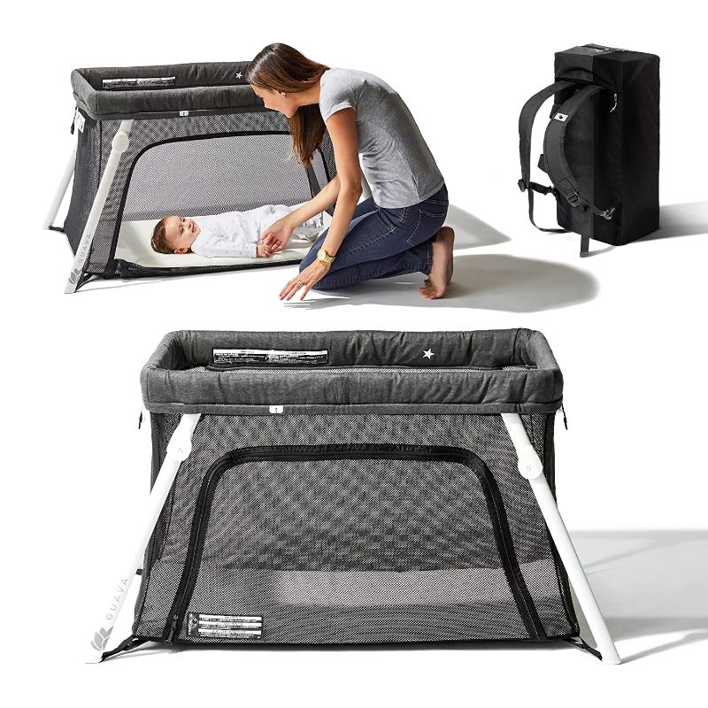 Photo 1 of Guava Family Lotus Travel Crib | Certified Baby Safe Portable Crib with Mattress | Folding Portable Playpen for Babies and Toddlers | Play Yard with Lightweight Backpack Design | Perfect for Airplanes
