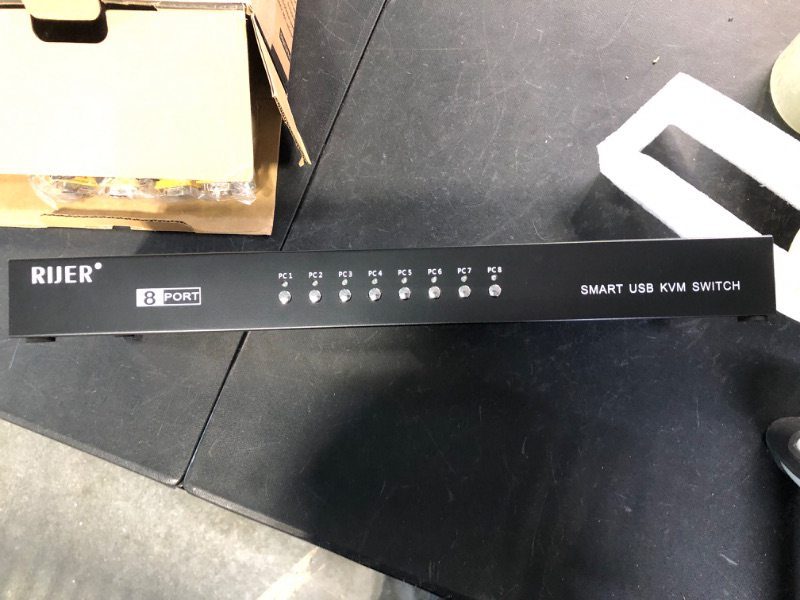 Photo 2 of RIJER 8 Port Manual Smart VGA USB KVM Switch 801UK PC Computer DVR Selector 1 KM Combo Controls 8 Hosts with Extension Switcher and 8PCS Original Cable
