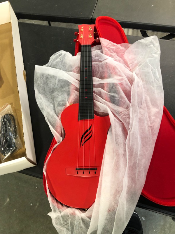 Photo 1 of Enya Nova U 23" Concert Ukulele–Carbon Fiber Travel Ukulele–With Beginner Kit includes Online Lessons, Case, Strap, Capo and Strings (Red)
