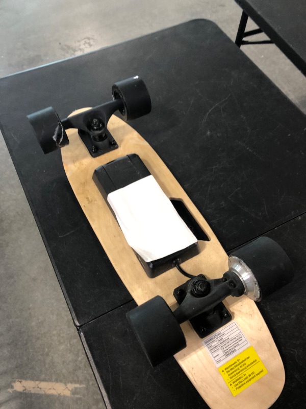 Photo 1 of Electric Skateboard with Wireless Remote Control, Electric Skateboards Longboard for Adults Beginner, 7 Layers Maple 20 MPH Top Speed, 10 Miles Range
