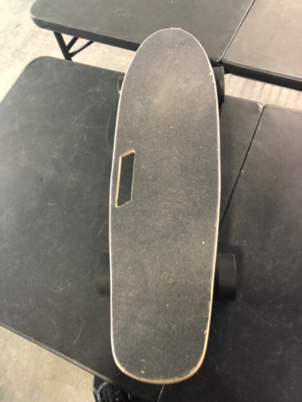 Photo 1 of Electric Skateboard with Wireless Remote Control, Electric Skateboards Longboard for Adults Beginner, 7 Layers Maple 20 MPH Top Speed, 10 Miles Range
