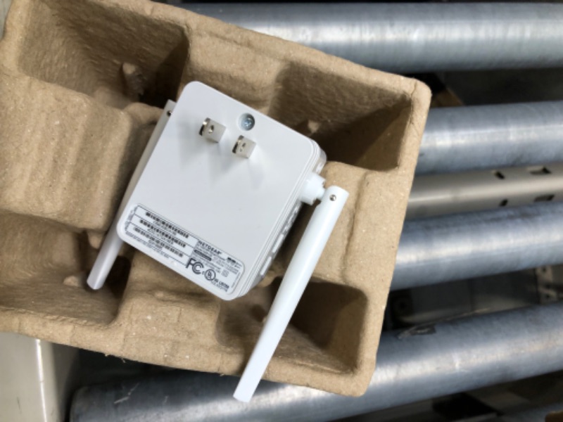 Photo 1 of NETGEAR Wi-Fi Range Extender EX6120 - Coverage Up to 1500 Sq Ft and 25 Devices with AC1200 Dual Band Wireless Signal Booster & Repeater (Up to 1200Mbps Speed), and Compact Wall Plug Design WiFi Extender AC1200
