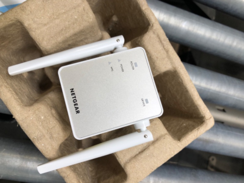 Photo 1 of NETGEAR Wi-Fi Range Extender EX6120 - Coverage Up to 1500 Sq Ft and 25 Devices with AC1200 Dual Band Wireless Signal Booster & Repeater (Up to 1200Mbps Speed), and Compact Wall Plug Design WiFi Extender AC1200