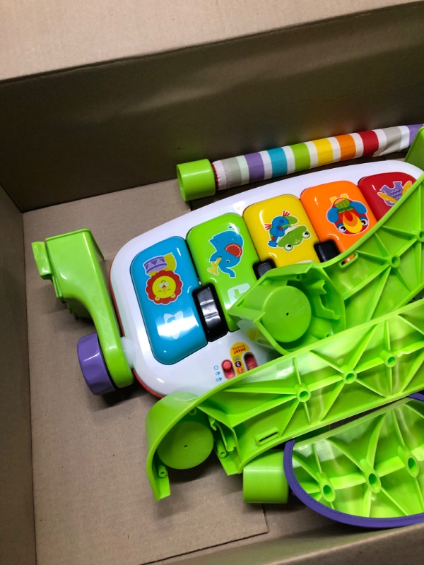 Photo 1 of Fisher-Price Deluxe Kick & Play Piano Gym, Baby Activity Playmat With Toy Piano, Lights, Music And Smart Stages Learning Content For Newborns And Up Kick 'n Play Piano - Frustration Free Packaging