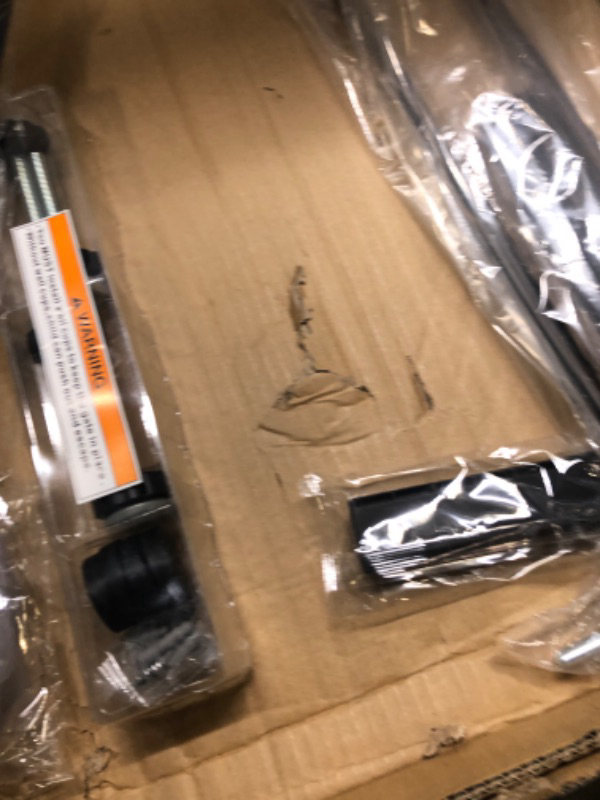 Photo 1 of Black auto close safety gate 54.33-57.08 inches