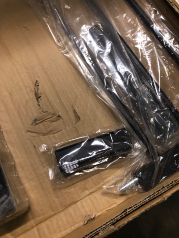 Photo 1 of Black auto close safety gate 54.33-57.08 inches