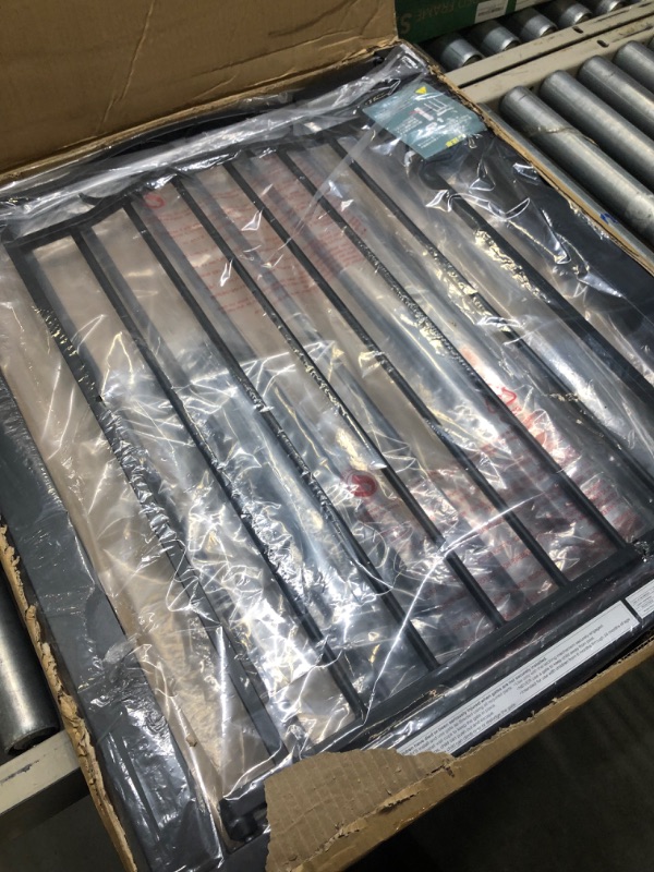 Photo 1 of Black auto close safety gate 54.33-57.08 inches