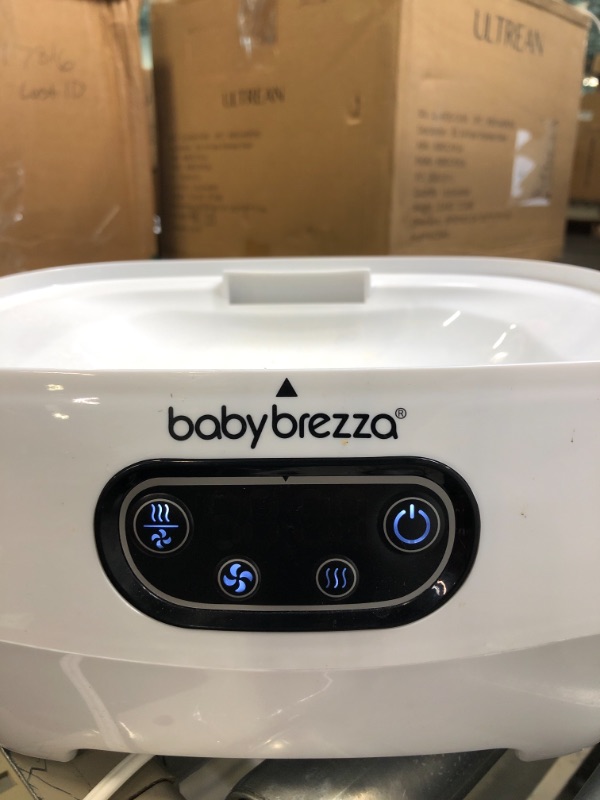 Photo 2 of Baby Brezza Baby Bottle Sterilizer and Dryer Advanced – Electric Steam Sterilization Machine – Universal Sterilizing for All Bottles: Plastic + Glass + Pacifiers + Breast Pump Parts - HEPA Filtration