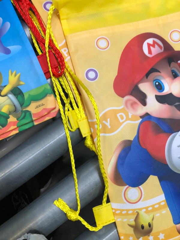 Photo 3 of 12 PCS Mario Party Bags Non-Woven Drawstring Goodie Bags for Mario Party Supplies, Mario Brothers Themed Party Supplies Favors, Birthday Party Decorations, School Backpacks