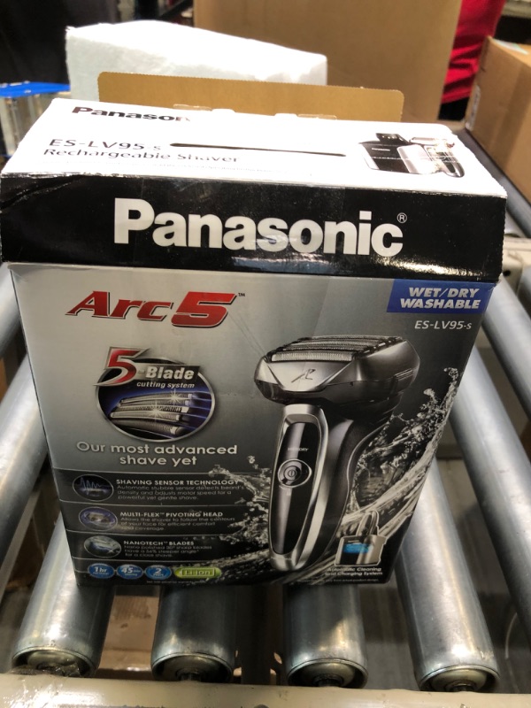 Photo 2 of Panasonic Arc5 Electric Razor for Men, 5 Blades Shaver and Trimmer - Sensor Technology, Automatic Clean and Charge Station, Wet Dry, Silver LV95 Electric Shaver & Auto Cleaning Charging System