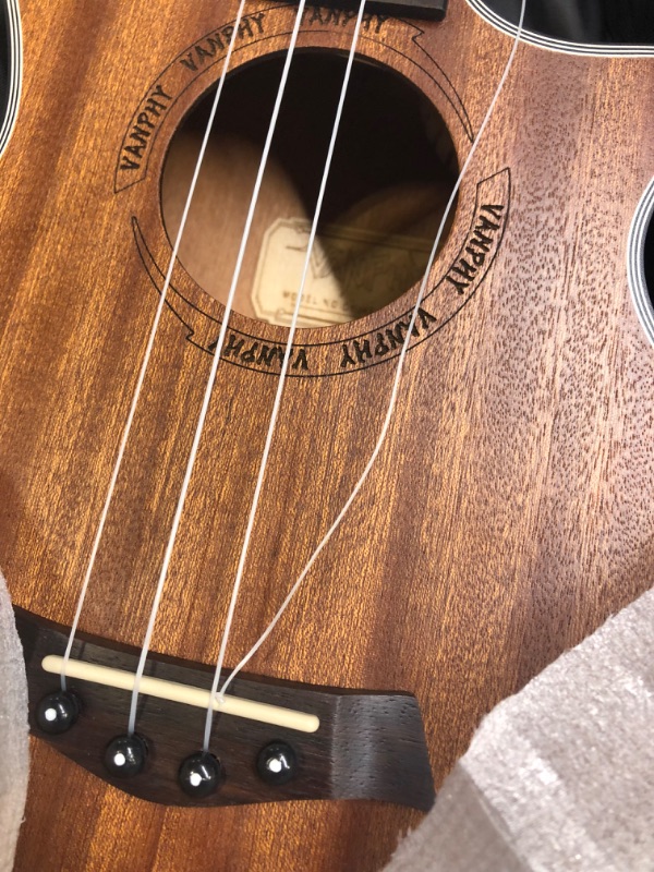 Photo 3 of VANPHY Tenor Ukulele for beginner, Hawaiian ukelele 26 inch Professional, Wooden sapele uke for Starter, Tenor Ukulele bundle kit with gig bag Tuner string strap (Tenor) Tenor 26"