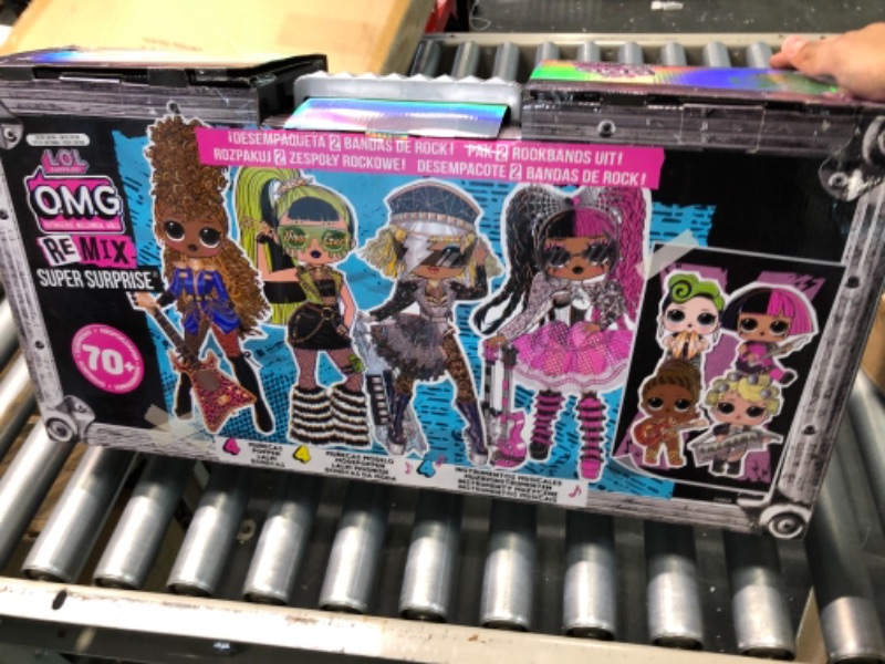 Photo 3 of L.O.L. Surprise! OMG Remix Super Surprise with 70+ Surprises, Plays Music, 4 Fashion Dolls And 4 Dolls (Sisters), Rock Instruments, Boom Box Packaging, And Rock Band Accessories | Ages 4+