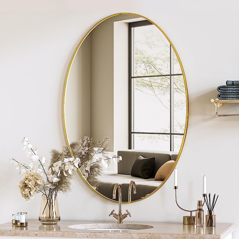 Photo 1 of Modern 30 in. H x 1 in. W Oval Wall Hanging Bathroom Mirror, Accent Gold