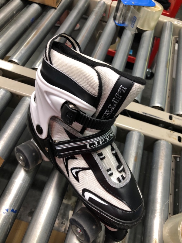 Photo 1 of roller skates black and white 