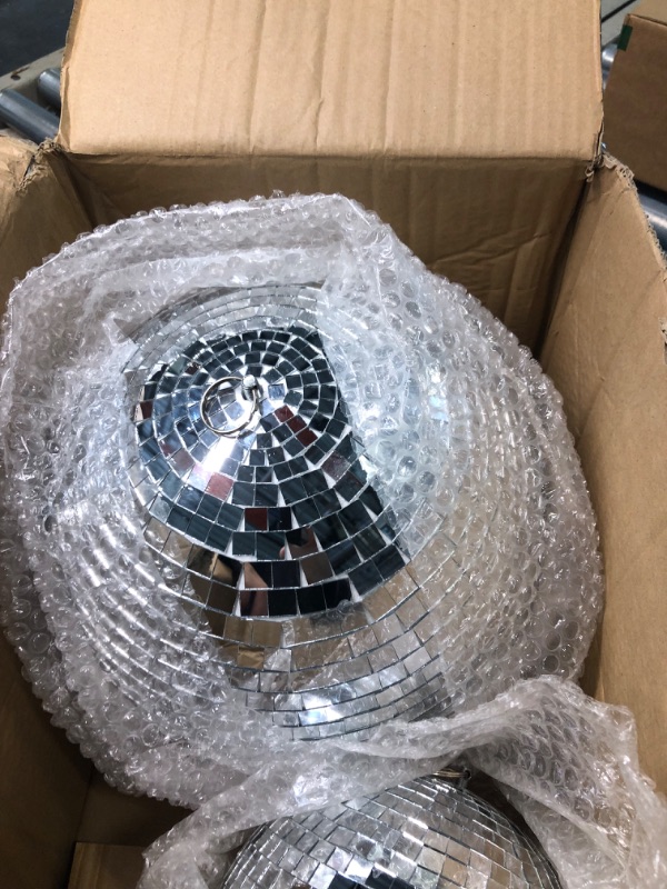 Photo 4 of 2 Pack Large Disco Ball Silver Hanging Mirror Disco Ball Reflective Mirror Disco Ball Ornament for Party Holiday Wedding Dance Music Festivals Decor Club Stage Props DJ Decoration (8 Inch, 12 Inch)