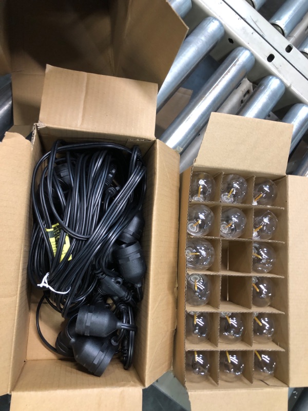 Photo 2 of addlon LED Outdoor String Lights 48FT with Edison Vintage Shatterproof Bulbs and Commercial Grade Weatherproof Strand - ETL Listed Heavy-Duty Decorative Lights for Patio Garden 48FT Black
In box with light bulbs two may or may not be missing, unless that'