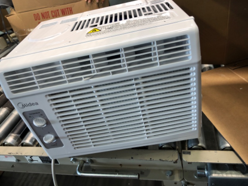 Photo 1 of Midea 5,000 BTU EasyCool Window Air Conditioner and Fan & 6,000 BTU EasyCool Window Air Conditioner, Dehumidifier and Fan - Cool 5000 BTU Air Conditioner + Air Conditioner