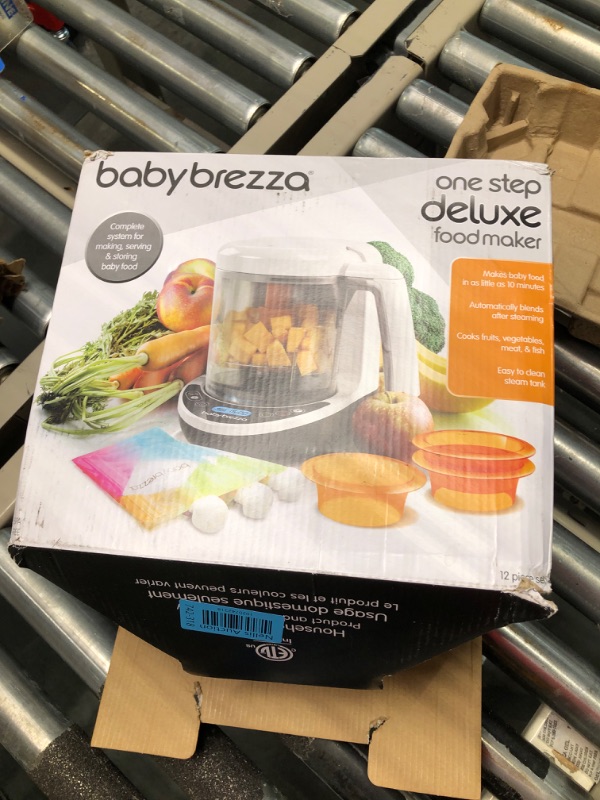 Photo 2 of Baby Brezza One Step Baby Food Maker Deluxe – Cooker and Blender to Steam + Puree in 1 Step – Auto Shut Off - Make Organic Food for Infants and Toddlers - Set of 3 Pouches + 3 Funnels
