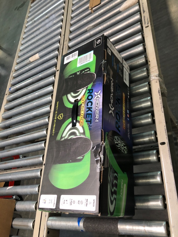 Photo 1 of Hover-1 Rocket Electric Self-Balancing Hoverboard with 6.5” LED Light-Up Wheels, Dual 160W Motors, 7 mph Max Speed, and 3 Miles Max Range Green 2.0