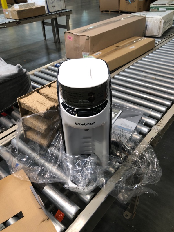 Photo 1 of New and Improved Baby Brezza Formula Pro Advanced Formula Dispenser Machine - Automatically Mix a Warm Formula Bottle Instantly - Easily Make Bottle with Automatic Powder Blending