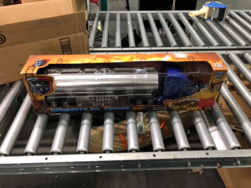 Photo 1 of New DIECAST Toys CAR New RAY 1:32 Long HAUL Trucker - Kenworth T700 Oil Tanker (Blue/Chrome) 12223E
