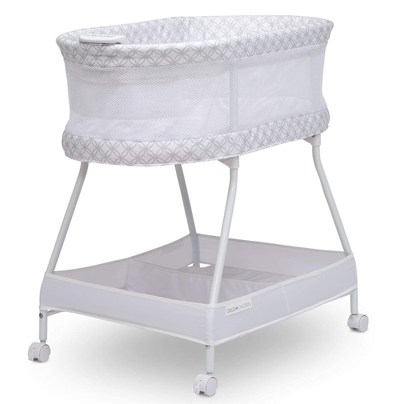 Photo 1 of Delta Children Sweet Dreams Bassinet with Airflow Mesh Bedside Portable Crib with Vibration Lights and Music, Grey Infinity