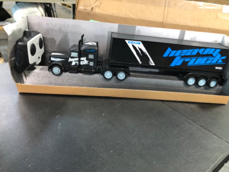 Photo 4 of Vokodo RC Semi Truck And Trailer 18 Inch 2.4Ghz Fast Speed 1:16 Scale Electric Hauler Rechargeable Battery Included Remote Control Car Kids Big Rig Toy Vehicle Great Gift For Children Boy Girl (Black)