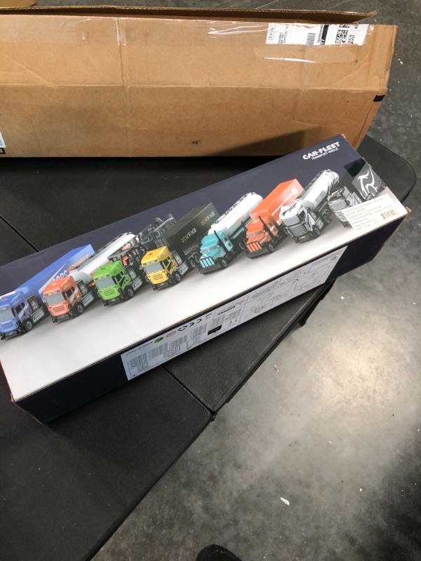 Photo 1 of Vokodo RC Semi Truck And Trailer 18 Inch 2.4Ghz Fast Speed 1:16 Scale Electric Hauler Rechargeable Battery Included Remote Control Car Kids Big Rig Toy Vehicle Great Gift For Children Boy Girl (Black)