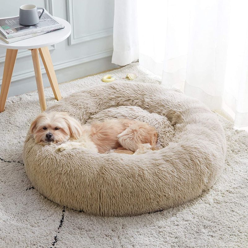 Photo 1 of Calming Dog Bed & Cat Bed, Anti-Anxiety Donut Dog Cuddler Bed, Warming Cozy Soft Dog Round Bed, Fluffy Faux Fur Plush Dog Cat Cushion bed for Small Medium Dogs and Cats