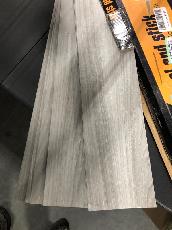 Photo 2 of Art3dwallpanels Peel and Stick Floor Tiles Vinyl Flooring Planks, 24 Sheets 36 Sq.Ft Black Adhesive Wood Plank, Thin Design 36×6×0.1 Inch Light Gray 24